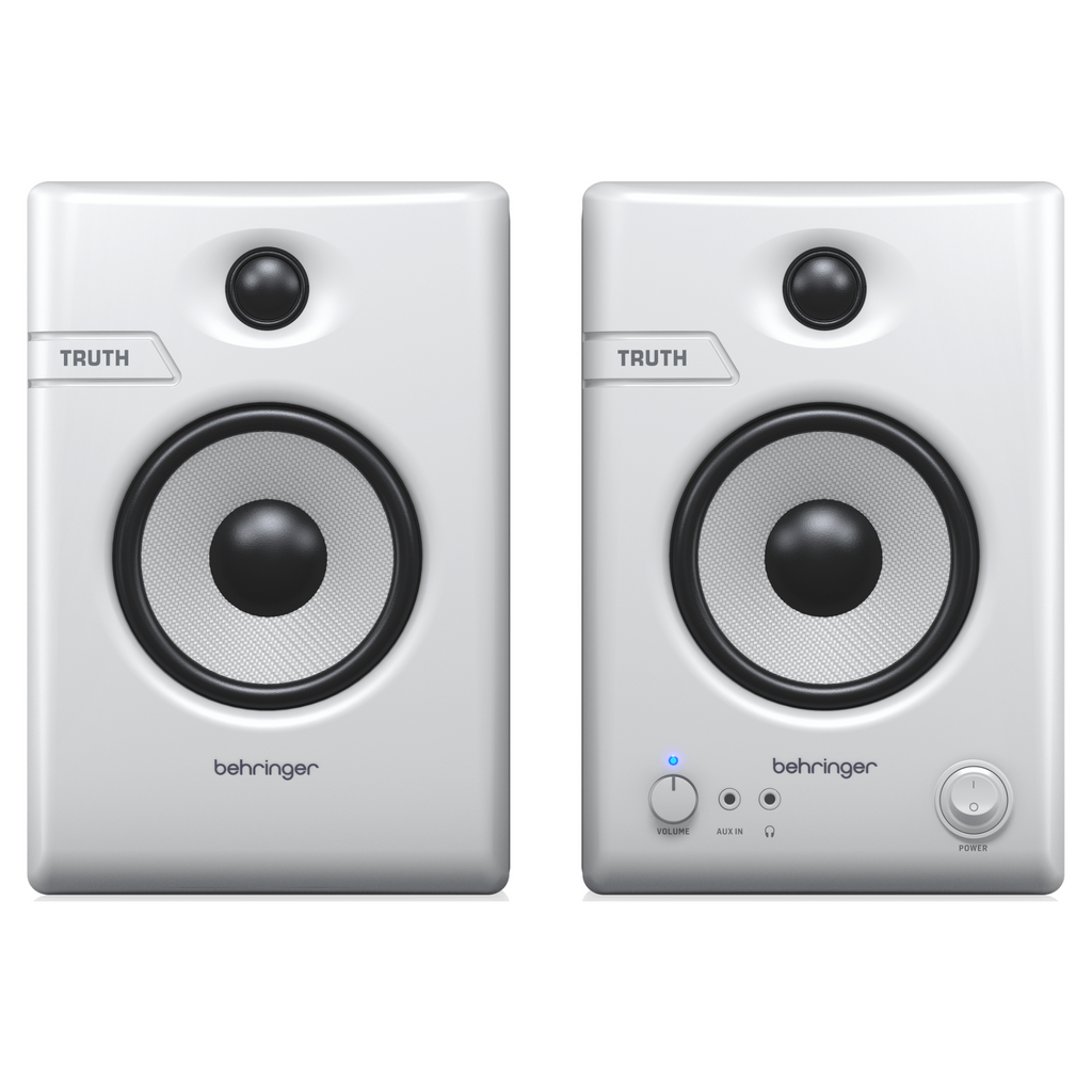 Pair of Behringer Truth 4.5 studio monitor speakers in white with Bluetooth connectivity, designed for professional audio monitoring.