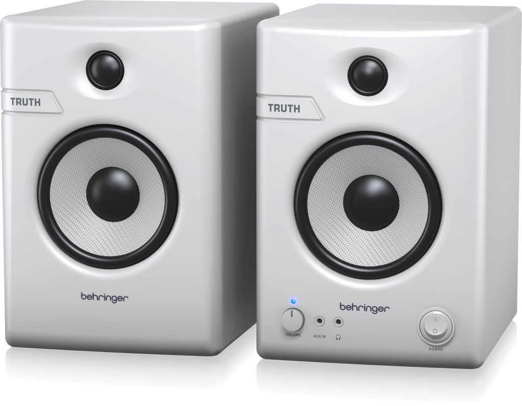 Pair of Behringer Truth 4.5 studio monitor speakers with Bluetooth in white, showing front view with speaker drivers and controls