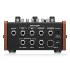 Behringer BM-15M Murf Box effects pedal with controls and input/output jacks visible, used for creating unique sound effects.