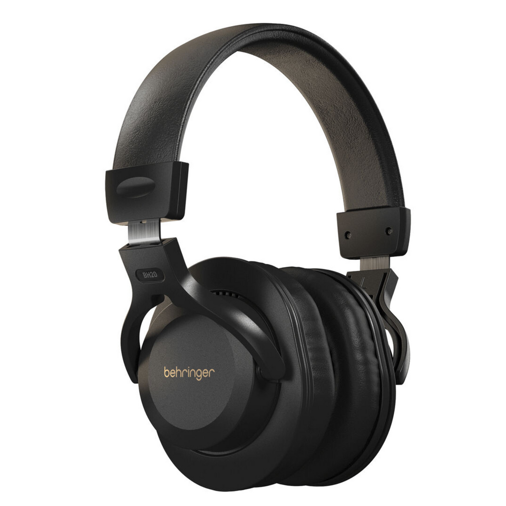 Behringer BH20 closed-back studio headphones with padded ear cups and adjustable headband, designed for professional audio monitoring.