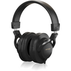 Behringer BH20 closed-back studio headphones with padded ear cups and adjustable headband for comfortable sound monitoring.