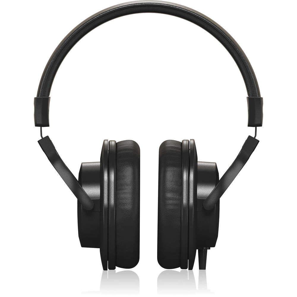 Behringer BH20 closed-back studio headphones with cushioned ear cups and adjustable headband for comfortable listening.