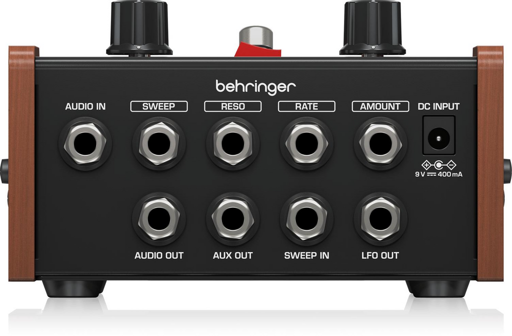 Behringer BM-13 Phaser Effects Pedal with control knobs and input/output jacks for guitar or bass effects.