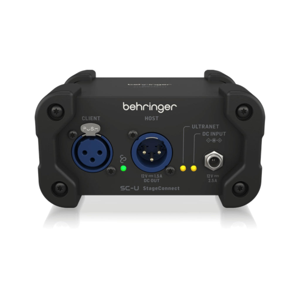 Behringer SC-U Stageconnect Ultranet USB interface for PA systems, shown with ports and USB connection in a close-up image.