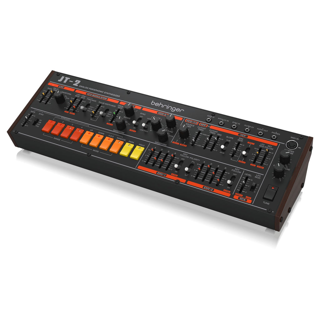 Behringer JT-2 Euro Rack paraphonic synthesizer module with knobs and patch points in a metal rack enclosure.