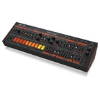 Behringer JT-2 Euro Rack paraphonic synthesizer module with knobs and patch points in a metal rack enclosure.