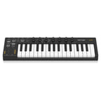 Behringer JAM MIDI Controller Keyboard with knobs and keys, compact music production controller for MIDI input and control.
