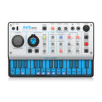 Behringer AKS Mini analog polyphonic synthesizer keyboard with control knobs and keys, compact electronic music instrument.