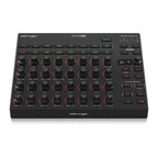 Behringer BCR32 MIDI controller with USB and MIDI ports, featuring rotary knobs and buttons for music production control.