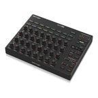 Behringer BCR32 MIDI controller with USB and MIDI ports, featuring rotary knobs and sliders for music production control.