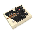 Behringer VT999 Vintage Tube Monster overdrive effects pedal with metal casing and control knobs for guitar distortion.