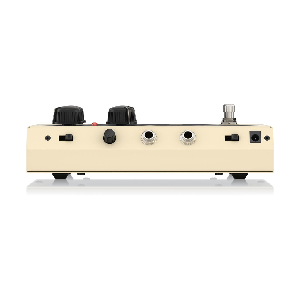 Behringer VT999 Vintage Tube Monster overdrive guitar effects pedal with metal casing and knob controls on top.