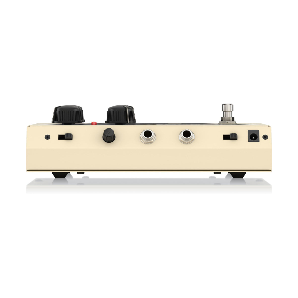 Behringer VT999 Vintage Tube Monster overdrive guitar effects pedal with metal casing and knob controls on top.
