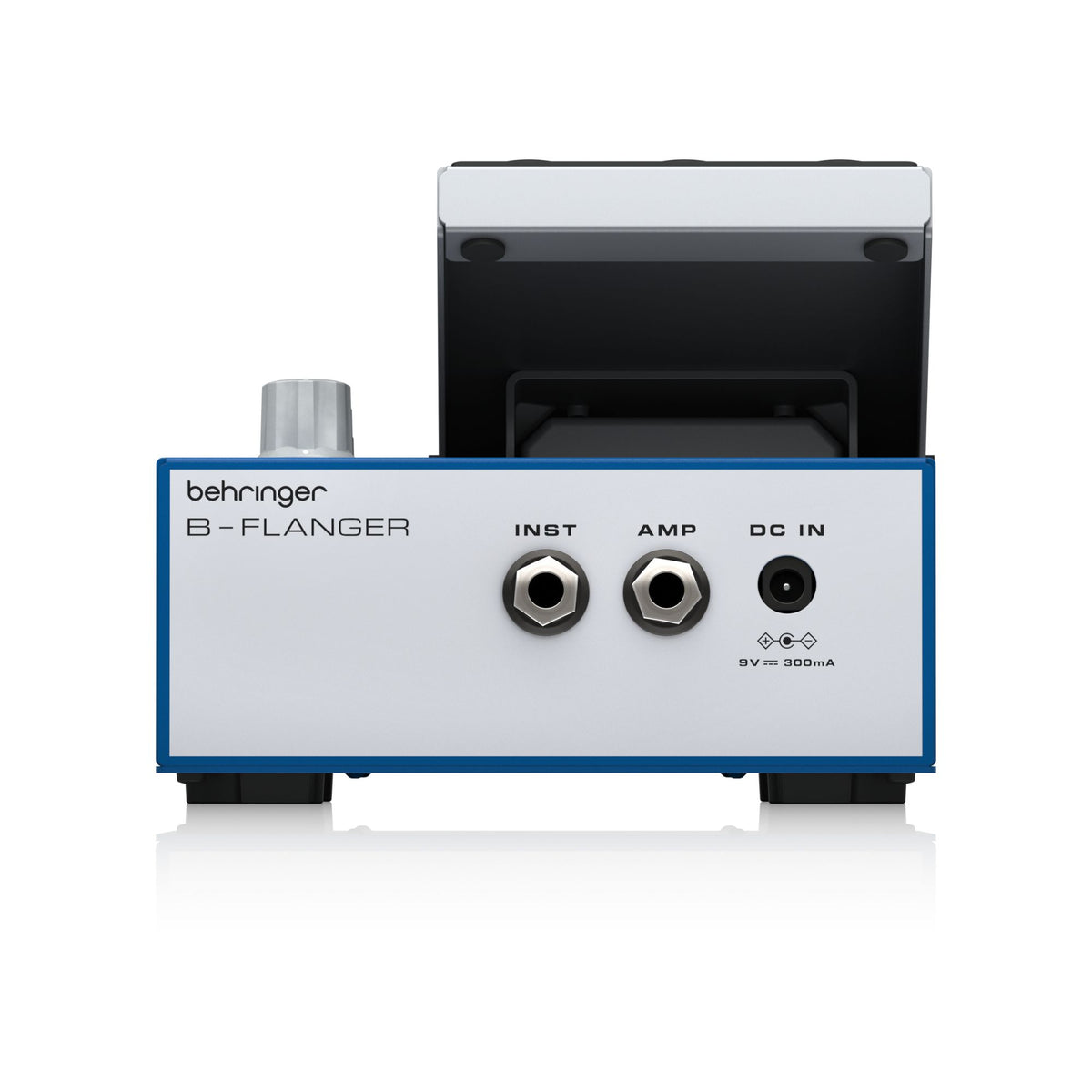 Behringer B-Flanger analog effects pedal for guitar with control knobs and input/output jacks on a pedalboard.
