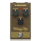 TC Electronic Honey-Pot vintage-flavored fuzz effects pedal with control knobs and input/output jacks, designed for guitar effects.