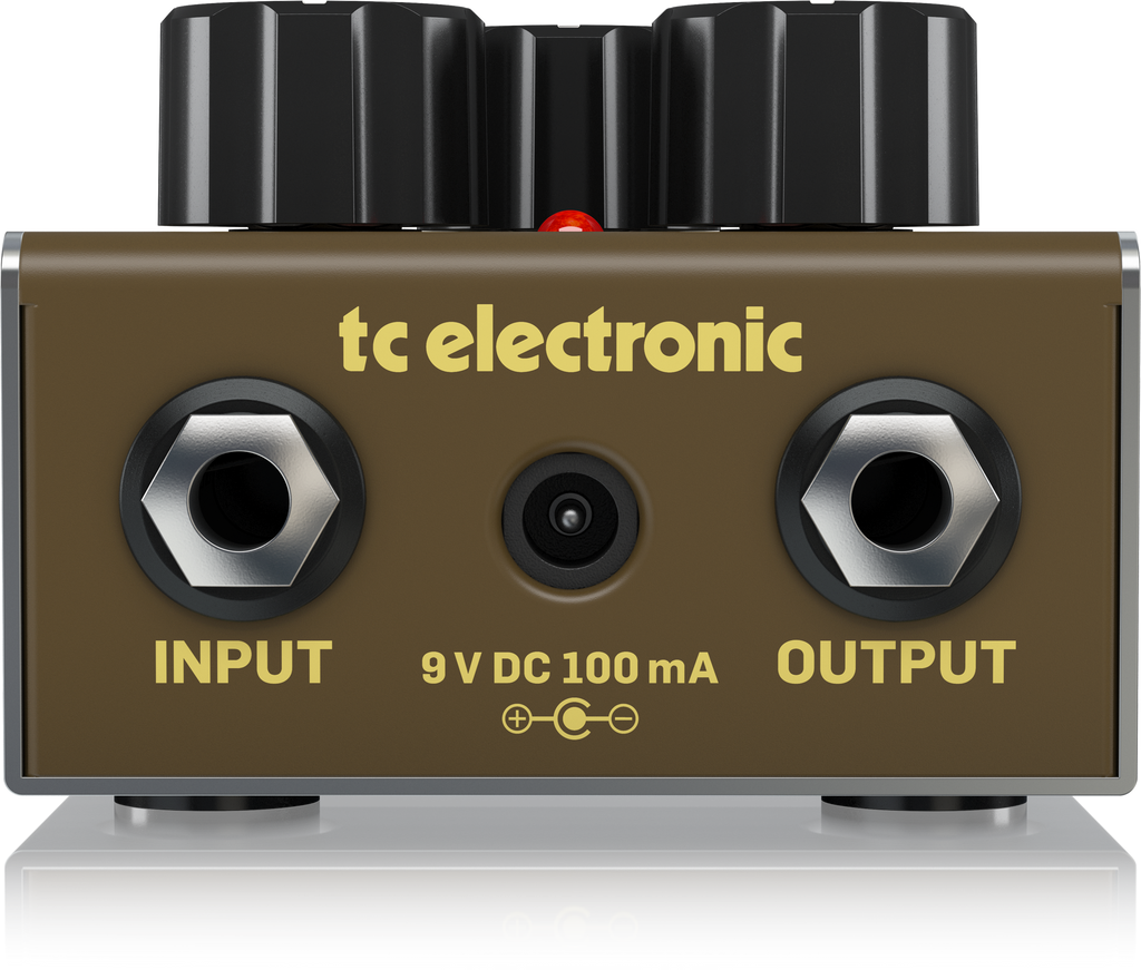 TC Electronic Honey-Pot vintage-flavored fuzz effects pedal with knobs and input/output jacks on a pedalboard.