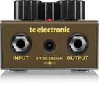 TC Electronic Honey-Pot vintage-flavored fuzz effects pedal with knobs and input/output jacks on a pedalboard.