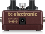 TC Electronic MojoMojo overdrive effects pedal with control knobs and input/output jacks, designed for guitar effects.