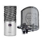 Aston Microphones Origin Silver Bundle featuring a microphone, shock mount, and pop filter on a studio desk.