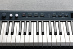 Kurzweil KA P1 LB portable digital piano with black finish, compact design, and full-size keys for versatile musical practice and performance