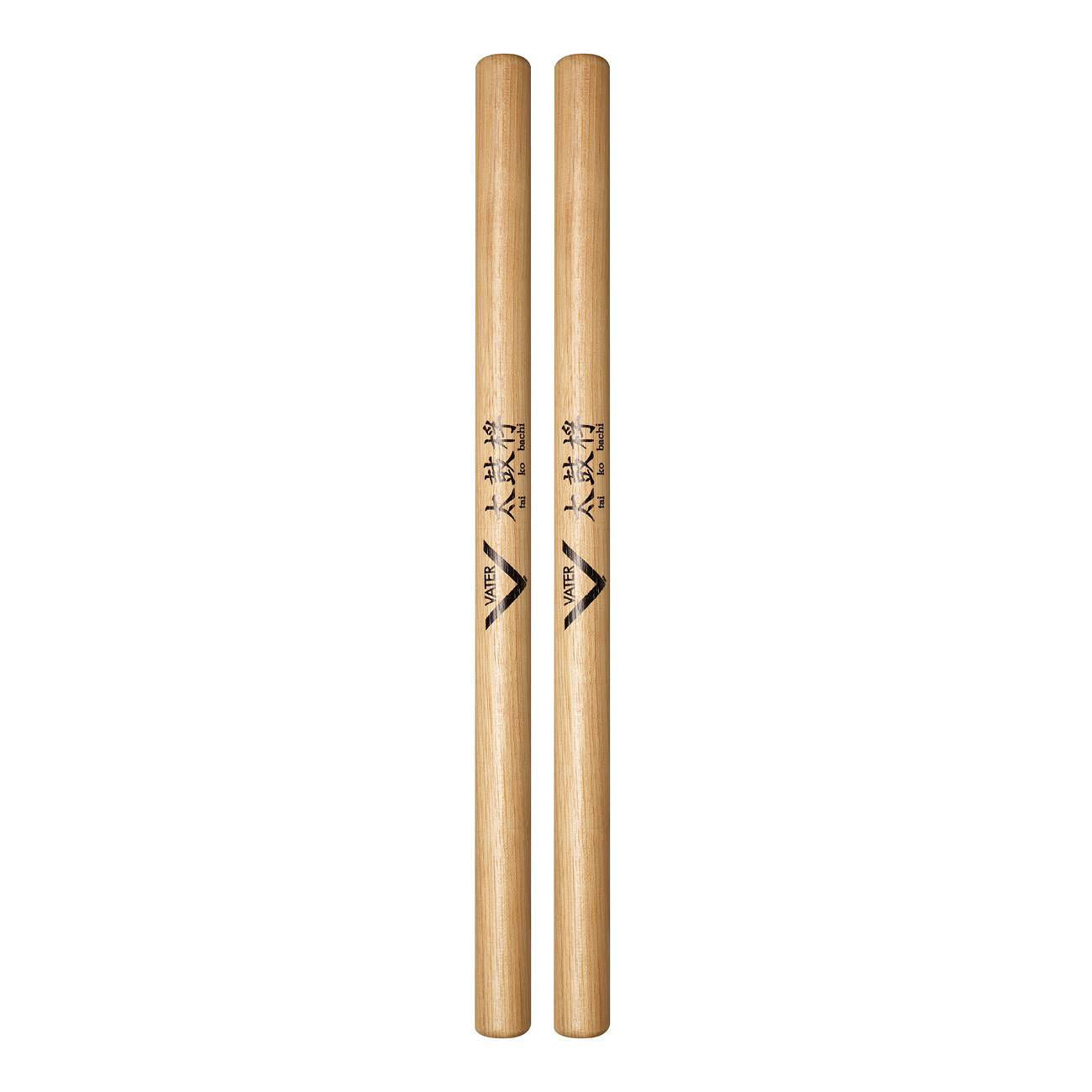 Vater VHTKBW Tai Ko Bachi drumsticks with wooden handles for percussion playing, shown resting on a drum kit.