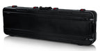 GATOR Gator GTSA-KEY88SL slim molded keyboard case with wheels and TSA locks for 88-note keyboards, black protective carrying case