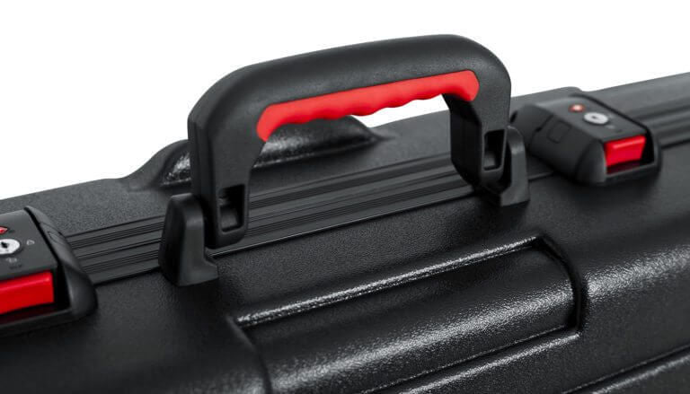 GATOR Gator GTSA-KEY88SL slim molded keyboard case with wheels and TSA locks for 88-note keyboards, showing sturdy exterior and handle.