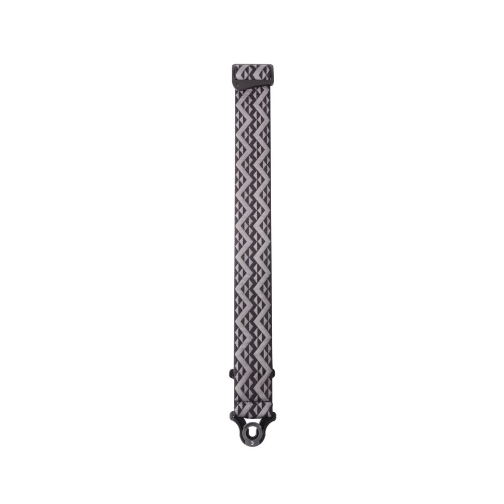 Black D'Addario Auto Lock padded guitar strap with geometric design, adjustable and comfortable for electric and acoustic guitars.