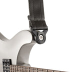 D'Addario Auto Lock guitar strap in metal grey with adjustable nylon strap and metal locking mechanism for secure fit.