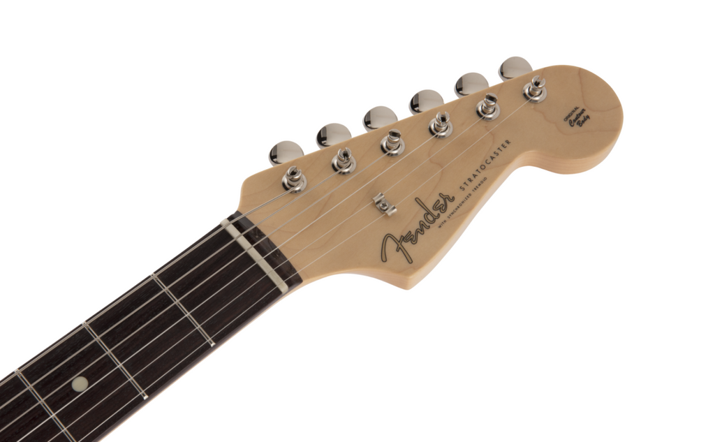 Fender MIJ Traditional '60s Stratocaster electric guitar in Fiesta Red with white pickguard and three single-coil pickups.