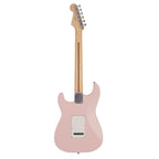 Fender MIJ Junior Jazz Bass guitar with a satin shell pink finish and maple fretboard, showcasing its sleek body and four-string setup.