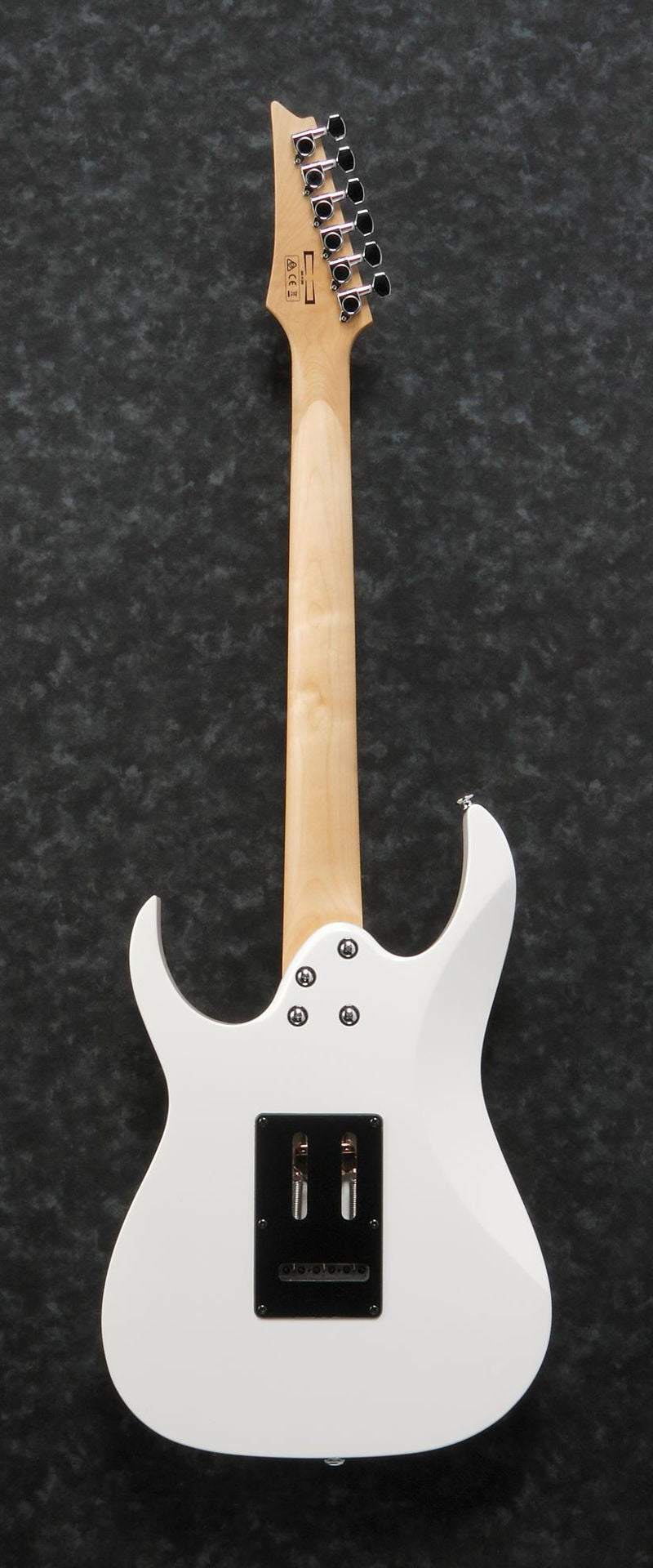 Ibanez GRG140 electric guitar in white with a sleek body and six strings, showcasing its modern design and hardware details.