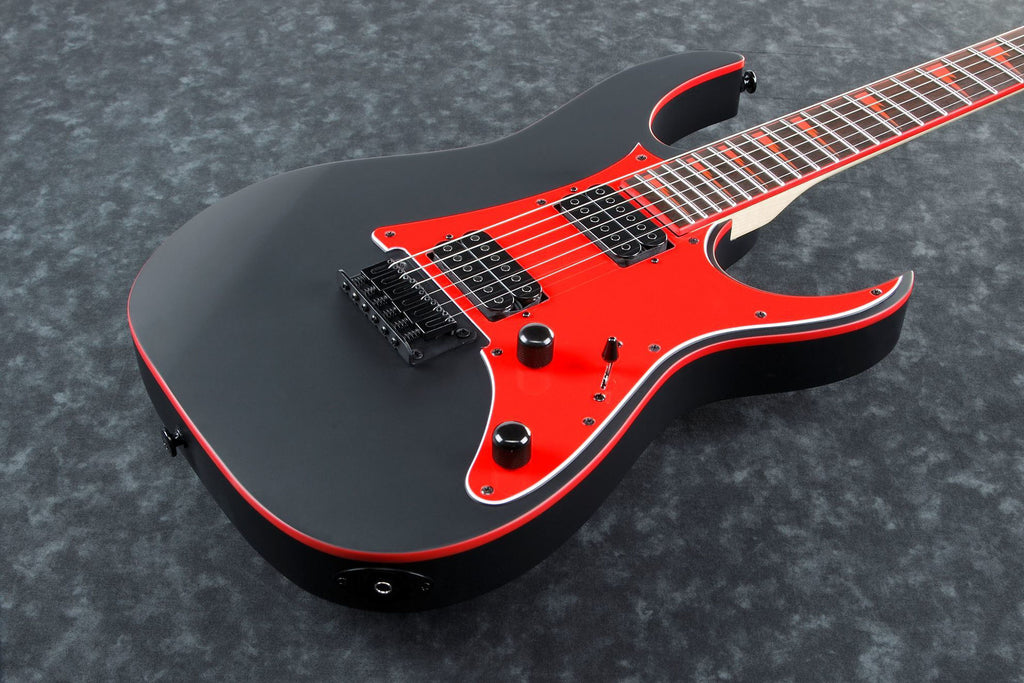 Ibanez RG131DX electric guitar in black flat finish, featuring a sleek body, six strings, and modern design.