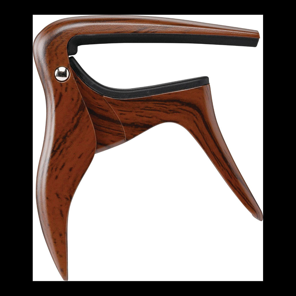 Ibanez IGC10W wooden finish guitar capo resting on a guitar neck, showcasing its smooth wood and metal clamp design.