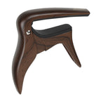 Ibanez IGC10W wooden finish guitar capo, compact and lightweight, designed for easy chord changes on acoustic and electric guitars.
