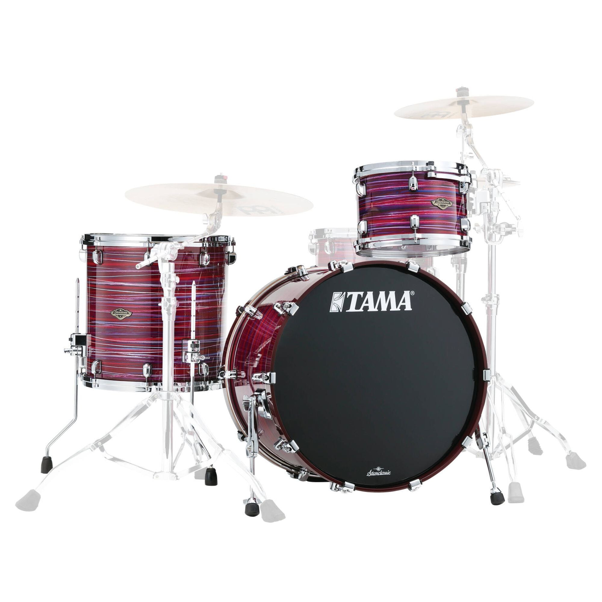 Tama Starclassic Walnut/Birch 22-inch 3-piece drum kit shell pack with lacquer Phantasm Oyster finish, featuring bass, toms, and snare shells.