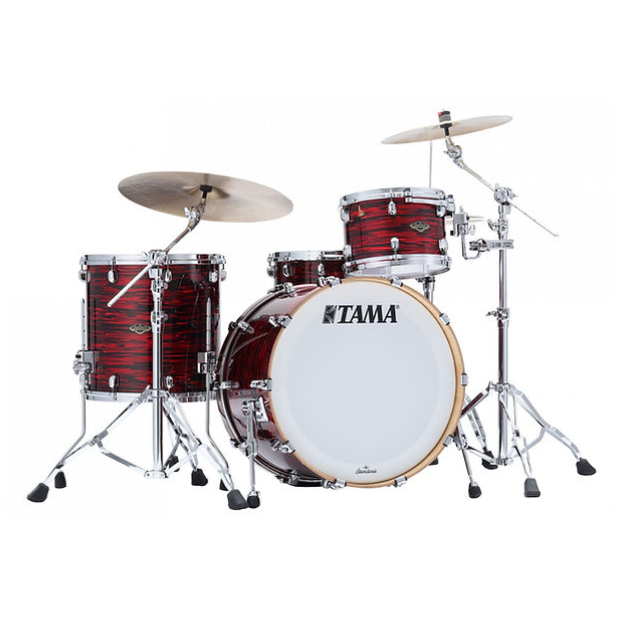Tama Starclassic Walnut/Birch 22-inch 3-piece drum kit shell pack with red oyster finish, including bass drum, toms, and hardware.