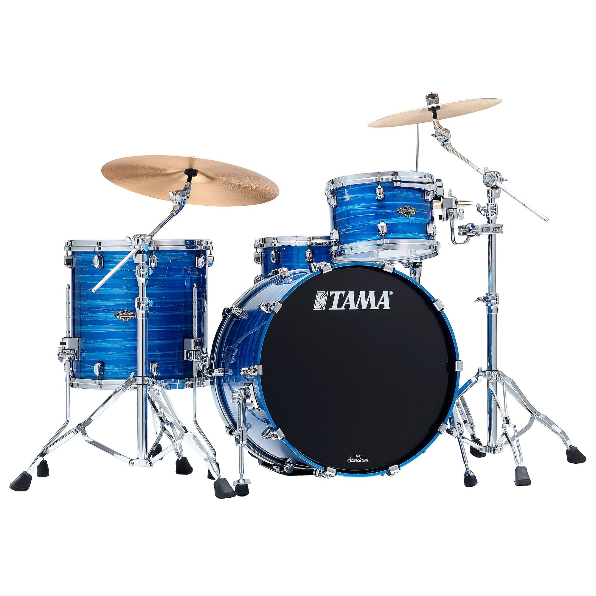 Tama Starclassic Walnut/Birch 22-inch 3-piece drum kit with Ocean Blue Ripple lacquer finish, featuring drums and hardware.