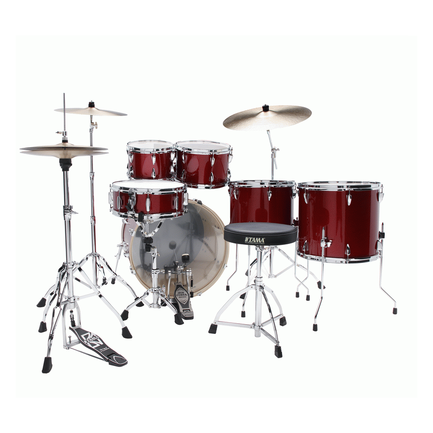 Tama Imperialstar 6-piece drum kit in Burnt Red Mist with bass, toms, snare, and cymbals, set up for playing.