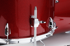 Tama Imperialstar 6-piece drum kit in Burnt Red Mist with bass drum, toms, snare, and hardware on a drum set image.