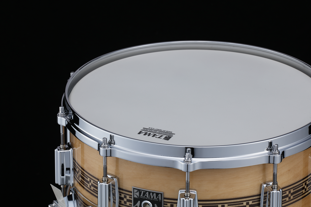 Tama 50th Limited Mastercraft ARTWOOD 14x6.5 snare drum with wooden shell and metal hardware, showcasing detailed craftsmanship.