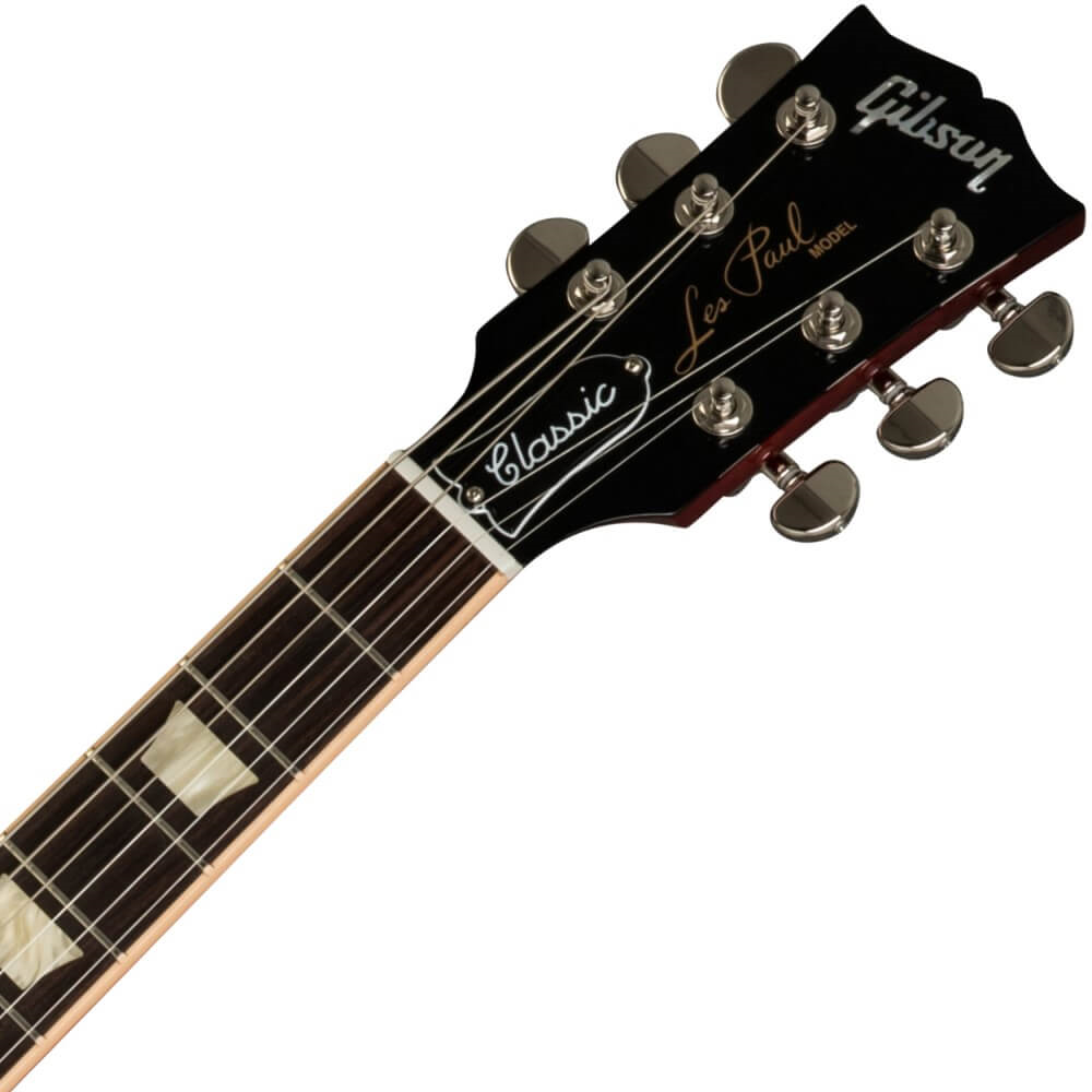 Gibson Les Paul Classic electric guitar in Heritage Cherry Sunburst finish, showcasing its solid body, chrome hardware, and vintage-style pickups.