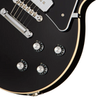 Gibson Noel Gallagher Les Paul Standard electric guitar in ebony finish, with dual humbucker pickups and chrome hardware.