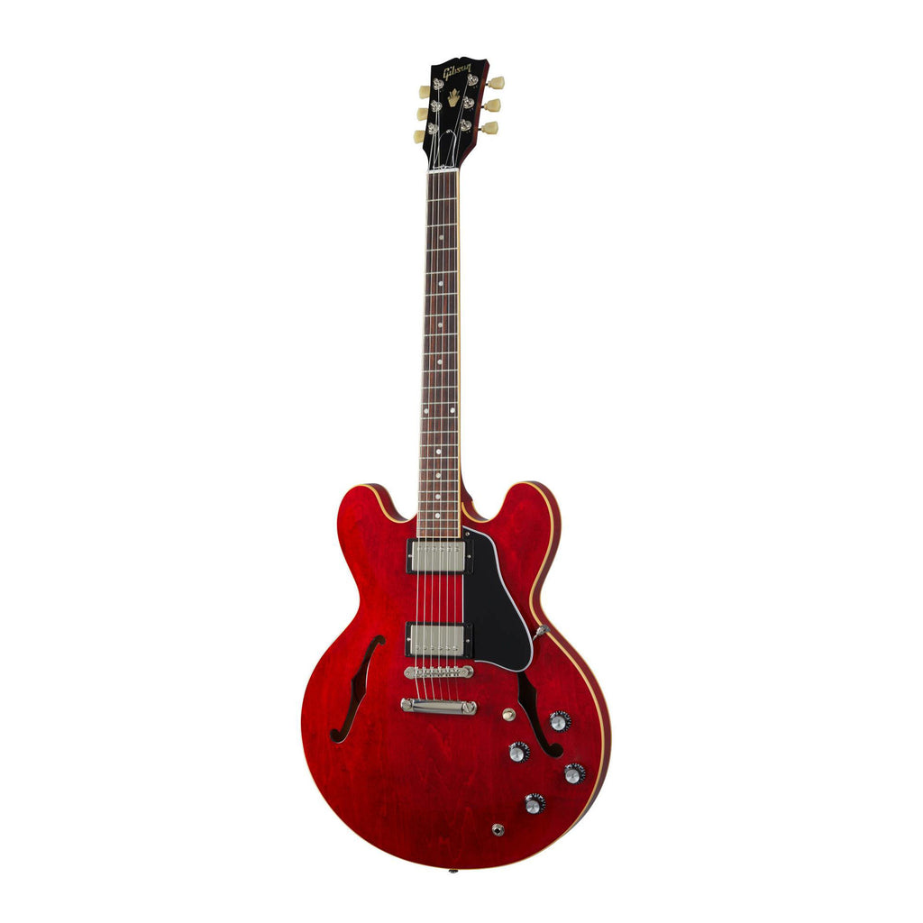 Gibson ES335 Sixties electric guitar in cherry finish, showcasing its double-cutaway body, f-holes, and vintage-style hardware.