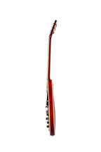 Gibson ES335 Sixties electric guitar in cherry finish, showcasing its classic semi-hollow body and vintage design.