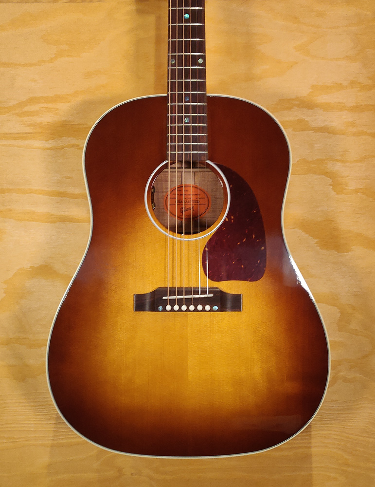 Gibson Limited Edition J45 acoustic guitar with Australian Blackwood top and body, showcasing the classic Gibson design and craftsmanship.