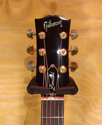 Gibson Limited Edition J45 acoustic guitar with Australian Blackwood top and body, showcasing rich wood grain and classic design.