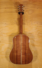Gibson Limited Edition J45 acoustic guitar with Australian Blackwood top and body, showcasing its natural wood grain and classic design.