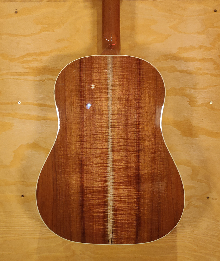 Gibson Limited Edition J45 acoustic guitar with Australian Blackwood top, showcasing its rich wood grain and classic design.