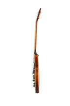 Epiphone ES-335 semi-hollow body electric guitar in vintage sunburst finish, showing the guitar's body and F-holes.